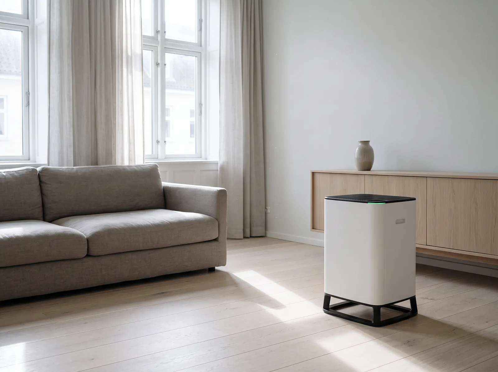 A Brio 650 beside an oak sideboard in a sunlit living room